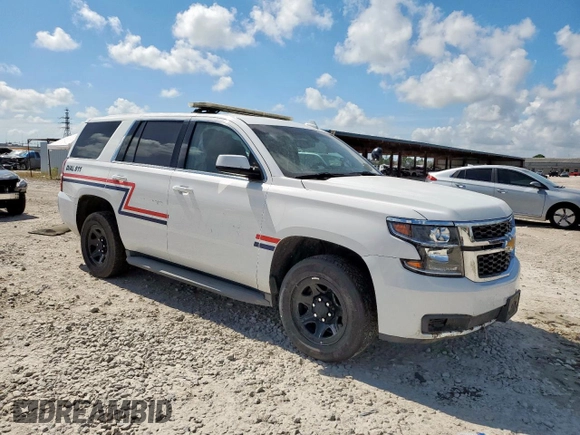 2015 Chevrolet Tahoe Commercial with VIN 1GNLC2EC4FR590119, listed as a Copart auction lot 62159795 with 93,021 mi miles and Salvage title. Bid and sale history available at DreamBid. Image 4.