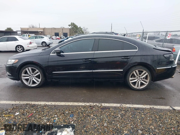 2013 Volkswagen CC Lux with VIN WVWRP7AN7DE510490, listed as a IAAI auction lot 41457328 with 154,443 mi miles. Bid and sale history available at carsss.com. Image 14.