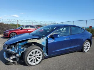 2021 Tesla Model 3 Standard Range Plus with VIN 5YJ3E1EAXMF096622, listed as a Copart auction lot 46530215 with 22,733 mi miles and Salvage Title. Bid and sale history available at DreamBid. Image 1.