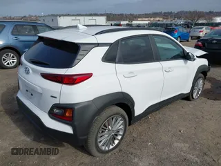 2021 Hyundai Kona SEL Plus with VIN KM8K6CAAXMU721999, listed as a IAAI auction lot 41790048 with 11,580 mi miles. Bid and sale history available at carsss.com. Image 4.