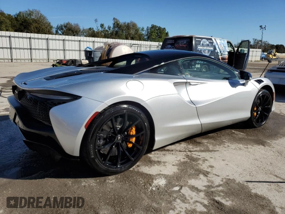 2023 McLaren Artura z VIN SBM16AEA4PW001953, wystawiony jako Copart lot #80270564 z przebiegiem 5956 mil mil oraz Nie do naprawy. Historia ofert i sprzedaży dostępna na DreamBid. Obrazek 3.