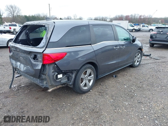 2018 Honda Odyssey EX-L z VIN 5FNRL6H70JB025227, wystawiony jako IAAI lot #41940992 z przebiegiem 95 797 mil mil oraz . Historia ofert i sprzedaży dostępna na DreamBid. Obrazek 4.