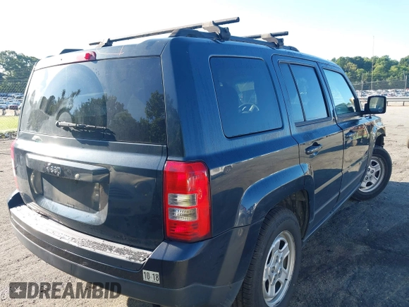 2014 Jeep Patriot Sport with VIN 1C4NJPBA0ED690284, listed as a IAAI auction lot 42513472 with 148,979 mi miles and . Bid and sale history available at DreamBid. Image 4.
