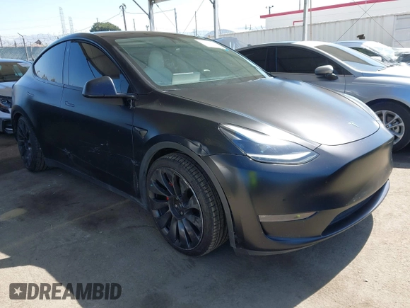 2022 Tesla Model Y Performance z VIN 7SAYGDEF0NF491586, wystawiony jako IAAI lot #42276747 z przebiegiem 117 203 mil mil oraz . Historia ofert i sprzedaży dostępna na DreamBid. Obrazek 1.