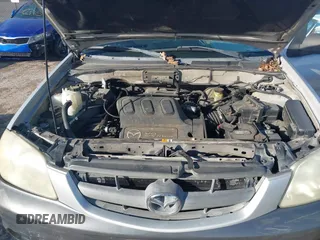 2003 Mazda Tribute LX with VIN 4F2YZ04183KM44733, listed as a IAAI auction lot 41472662 with 246,522 mi miles and . Bid and sale history available at DreamBid. Image 10.
