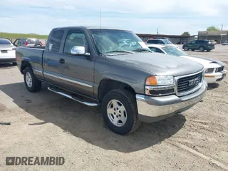 1999 GMC New Sierra 1500 SLE with VIN 2GTEK19T4X1515262, listed as a IAAI auction lot 41985162 with 344,021 mi miles. Bid and sale history available at carsss.com. Image 1.