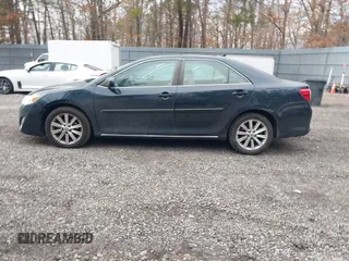 2014 Toyota Camry SE with VIN 4T1BK1FK6EU544726, listed as a IAAI auction lot 41630731 with 108,072 mi miles. Bid and sale history available at carsss.com. Image 14.