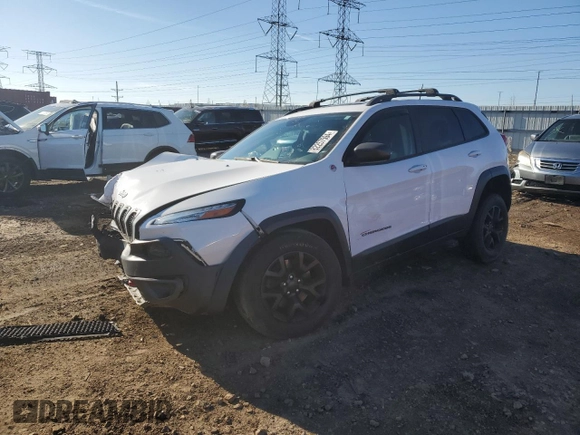 2017 Jeep Cherokee Trailhawk L Plus with VIN 1C4PJMBB3HW506965, listed as a Copart auction lot 82257594 with 106,571 mi miles and Salvage title. Bid and sale history available at DreamBid. Image 1.