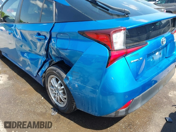 2020 Toyota Prius L Eco with VIN JTDKARFUXL3118354, listed as a IAAI auction lot 41991337 with 83,030 mi miles and . Bid and sale history available at DreamBid. Image 17.