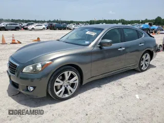 2012 Infiniti M with VIN JN1BY1AP9CM335647, listed as a Copart auction lot 63460075 with 141,419 mi miles and Salvage title. Bid and sale history available at DreamBid. Image 1.