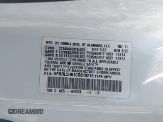 2012 Honda Odyssey EX-L with VIN 5FNRL5H61CB019215, listed as a IAAI auction lot 41837320 with 248,498 mi miles and . Bid and sale history available at DreamBid. Image 9.