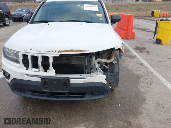 2016 Jeep Compass Sport with VIN 1C4NJDBB5GD804581, listed as a IAAI auction lot 41502976 with 196,351 mi miles and . Bid and sale history available at carsss.com. Image 18.