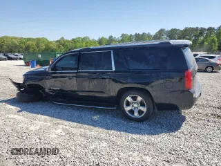 2018 Chevrolet Suburban Premier with VIN 1GNSCJKC1JR199271, listed as a Copart auction lot 52395935 with 216,083 mi miles and Salvage Title. Bid and sale history available at DreamBid. Image 2.