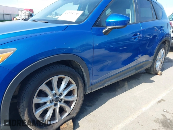 2014 Mazda CX-5 Grand Touring with VIN JM3KE4DY1E0327703, listed as a IAAI auction lot 41755735 with 206,845 mi miles. Bid and sale history available at carsss.com. Image 6.