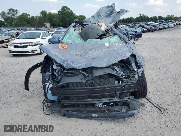 2023 Toyota Corolla Cross LE with VIN 7MUCAABG8PV066528, listed as a Copart auction lot 58902095 with 14,190 mi miles and Salvage title. Bid and sale history available at DreamBid. Image 5.
