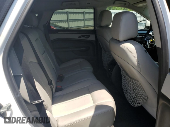 2014 Cadillac SRX z VIN 3GYFNAE32ES543932, wystawiony jako Copart lot #54256435 z przebiegiem 169 621 mil mil oraz Szkoda całkowita • Salvage title. Historia ofert i sprzedaży dostępna na DreamBid. Obrazek 11.