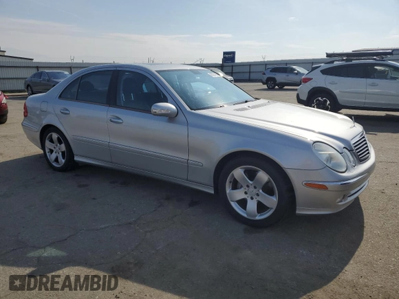 2005 Mercedes-Benz E 5.0L with VIN WDBUF70J55A617413, listed as a Copart auction lot 43297435 with 103,271 mi miles and Clean Title. Bid and sale history available at carsss.com. Image 4.
