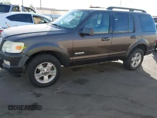 2007 Ford Explorer XLT with VIN 1FMEU63E87UA62040, listed as a IAAI auction lot 41013155 with 156,042 mi miles and . Bid and sale history available at DreamBid. Image 12.