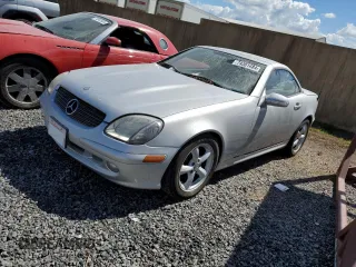 2001 Mercedes-Benz SLK-Class with VIN WDBKK65F31F228400, listed as a Copart auction lot 74381484 with Not Provided miles and Salvage Title. Bid and sale history available at carsss.com. Image 1.