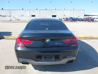 2014 BMW 6 Series 650i z VIN WBA6B2C55ED129419, wystawiony jako IAAI lot #39061341 z przebiegiem 68 790 mil mil oraz . Historia ofert i sprzedaży dostępna na DreamBid. Obrazek 16.