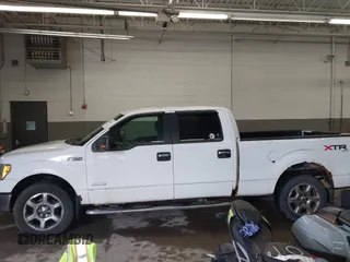 2013 Ford F-150 XL with VIN 1FTFW1ET2DFC90004, listed as a IAAI auction lot 42197040 with 298,331 mi miles and . Bid and sale history available at carsss.com. Image 14.