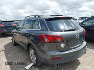 2015 Mazda CX-9 Touring with VIN JM3TB2CA7F0460232, listed as a IAAI auction lot 42344122 with 103,478 mi miles and . Bid and sale history available at DreamBid. Image 3.