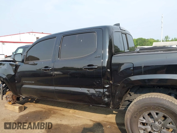 2023 Toyota Tacoma SR with VIN 3TYAX5GNXPT071314, listed as a IAAI auction lot 42389091 with 81,593 mi miles and . Bid and sale history available at DreamBid. Image 14.