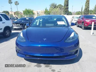 2023 Tesla Model 3 with VIN 5YJ3E1EA1PF431190, listed as a IAAI auction lot 41980007 with 26,164 mi miles and . Bid and sale history available at DreamBid. Image 12.