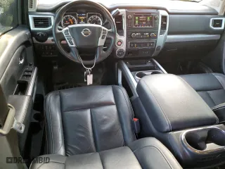 2019 Nissan Titan XD SV with VIN 1N6BA1F4XKN532266, listed as a Copart auction lot 77098244 with 105,965 mi miles and Salvage Title. Bid and sale history available at carsss.com. Image 8.