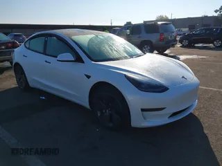 2023 Tesla Model 3 with VIN 5YJ3E1EA2PF582331, listed as a IAAI auction lot 41043858 with 33,601 mi miles and . Bid and sale history available at DreamBid. Image 1.