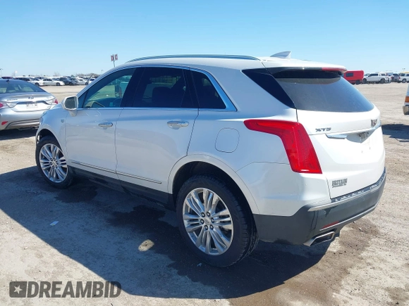 2017 Cadillac XT5 Premium Luxury FWD z VIN 1GYKNCRS9HZ106397, wystawiony jako IAAI lot #41659420 z przebiegiem 54 615 mil mil oraz . Historia ofert i sprzedaży dostępna na DreamBid. Obrazek 3.