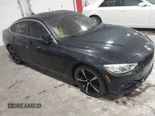2017 BMW 4 Series 430i xDrive z VIN WBA4F9C53HG440533, wystawiony jako IAAI lot #41207459 z przebiegiem 94 758 mil mil oraz . Historia ofert i sprzedaży dostępna na DreamBid. Obrazek 1.