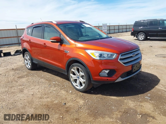 2019 Ford Escape Titanium with VIN 1FMCU9J92KUB28895, listed as a IAAI auction lot 42065235 with 112,305 mi miles and . Bid and sale history available at DreamBid. Image 1.