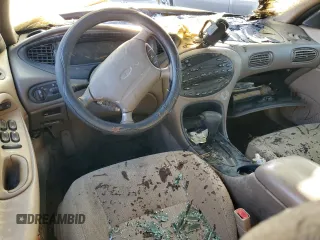 1998 Ford Taurus SE Comfort z VIN 1FAFP53S1WG176478, wystawiony jako Copart lot #80528034 z przebiegiem Nie podano mil oraz Szkoda całkowita • Salvage title. Historia ofert i sprzedaży dostępna na DreamBid. Obrazek 8.