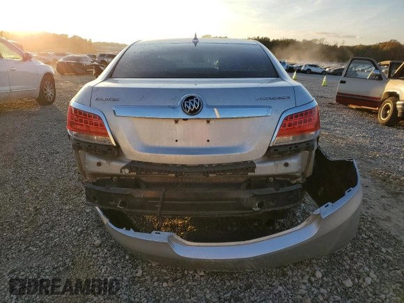 2012 Buick LaCrosse Touring с VIN 1G4GJ5E35CF131532, выставлен на аукционе Copart как лот 81626724 с пробегом 163 571 миль миль и Списание • Salvage title. История ставок и продаж доступна на DreamBid. Изображение 6.