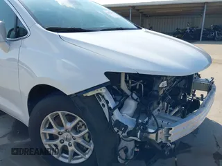2022 Chrysler Pacifica Touring L with VIN 2C4RC1BG8NR197706, listed as a IAAI auction lot 42414290 with 56,972 mi miles and . Bid and sale history available at DreamBid. Image 16.