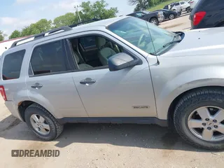 2008 Ford Escape XLT with VIN 1FMCU93188KD05798, listed as a IAAI auction lot 42497044 with 215,954 mi miles and . Bid and sale history available at DreamBid. Image 13.
