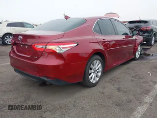 2020 Toyota Camry LE with VIN 4T1C11AK0LU954420, listed as a IAAI auction lot 41576657 with 56,863 mi miles. Bid and sale history available at carsss.com. Image 4.