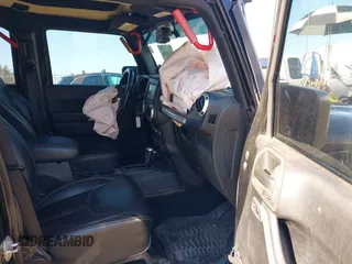 2015 Jeep Wrangler Unlimited Rubicon with VIN 1C4BJWFG9FL755152, listed as a IAAI auction lot 41293766 with 109,153 mi miles. Bid and sale history available at carsss.com. Image 5.