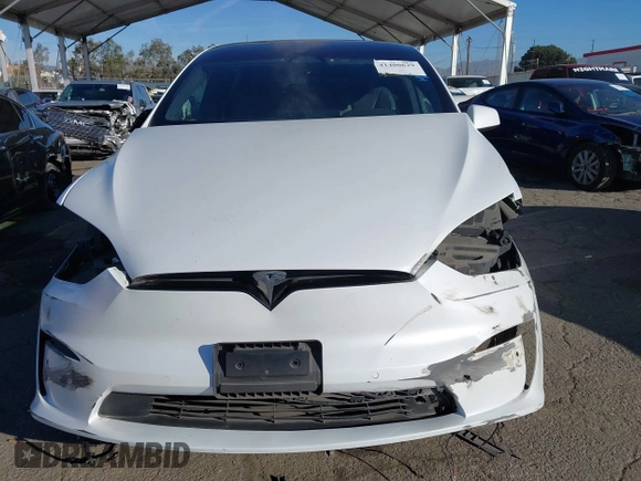 2022 Tesla Model X with VIN 7SAXCBE56NF329657, listed as a IAAI auction lot 41400629 with Not Provided miles and . Bid and sale history available at DreamBid. Image 13.