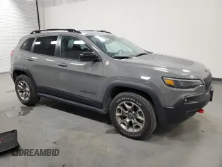 2022 Jeep Cherokee Trailhawk with VIN 1C4PJMBXXND556183, listed as a Copart auction lot 49327555 with 45,947 mi miles and Clean Title. Bid and sale history available at carsss.com. Image 4.