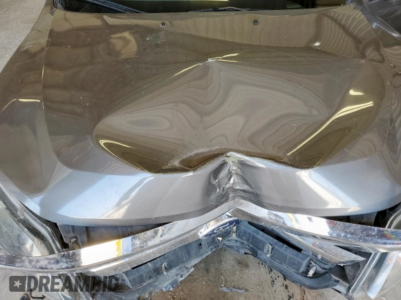 2012 Ford Fusion SE z VIN 3FAHP0HA1CR320160, wystawiony jako Copart lot #57597615 z przebiegiem 142 938 mil mil oraz Szkoda całkowita • Salvage title. Historia ofert i sprzedaży dostępna na DreamBid. Obrazek 11.