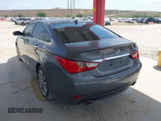 2014 Hyundai Sonata SE with VIN 5NPEC4AC4EH908832, listed as a IAAI auction lot 42099613 with 136,486 mi miles and . Bid and sale history available at DreamBid. Image 3.
