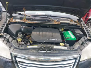 2012 Chrysler Town & Country Touring with VIN 2C4RC1BG7CR301101, listed as a IAAI auction lot 42173814 with 141,128 mi miles. Bid and sale history available at carsss.com. Image 10.