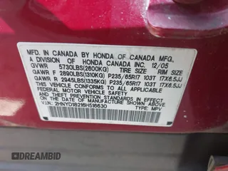 2006 Acura MDX with VIN 2HNYD18216H516630, listed as a IAAI auction lot 41757669 with 247,749 mi miles. Bid and sale history available at carsss.com. Image 9.