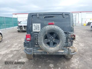 2012 Jeep Wrangler Unlimited Call of Duty MW3 z VIN 1C4BJWFG0CL202238, wystawiony jako IAAI lot #41956648 z przebiegiem 92 572 mil mil oraz . Historia ofert i sprzedaży dostępna na DreamBid. Obrazek 16.