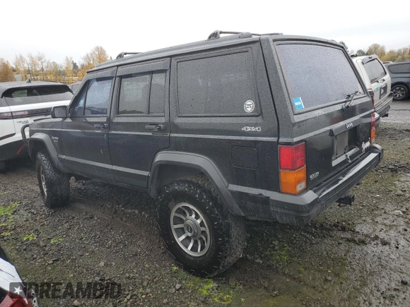 1996 Jeep Cherokee Sport with VIN 1J4FJ68S4TL240696, listed as a Copart auction lot 81193184 with 125,682 mi miles and Salvage Title. Bid and sale history available at carsss.com. Image 2.