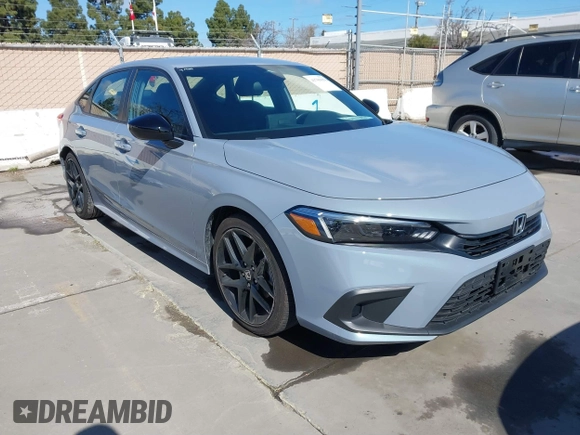 2022 Honda Civic Sport with VIN 2HGFE2F57NH600299, listed as a IAAI auction lot 41709059 with 9,060 mi miles and . Bid and sale history available at carsss.com. Image 1.