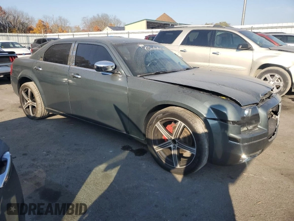 2005 Chrysler 300 with VIN 2C3JA53GX5H563815, listed as a Copart auction lot 81886344 with 144,630 mi miles and Salvage Title. Bid and sale history available at carsss.com. Image 4.