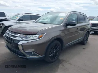 2018 Mitsubishi Outlander SE with VIN JA4AD3A38JZ030633, listed as a IAAI auction lot 41787274 with 70,696 mi miles and . Bid and sale history available at DreamBid. Image 2.